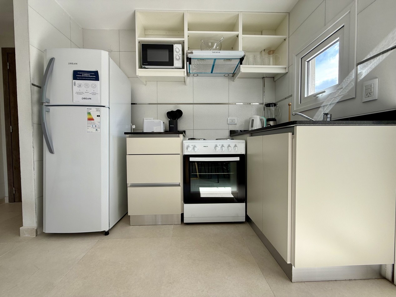 AMPLIO DEPARTAMENTO EN EDIFICIO FRENTE AL MAR